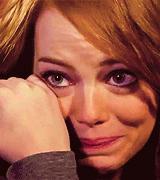 Emma Stone weeping with happiness.